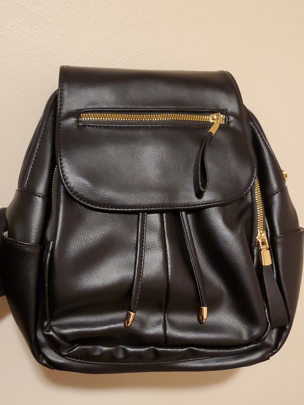 Black Faux Leather Women’s Backpack with Gold Hardware